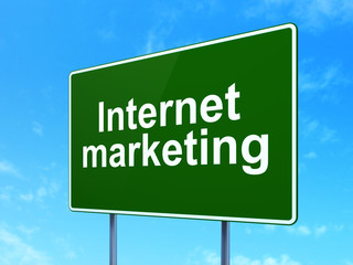 Marketing concept: Internet Marketing on road sign background