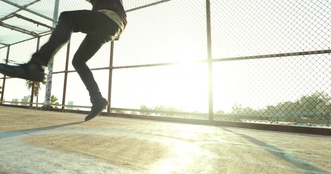 Young Man Breakdancing At Sunset 