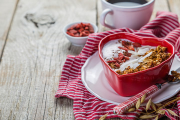 Valentine's day breakfast - granola with yogurt, goji berries and coconut