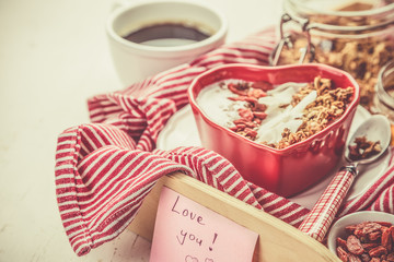 Valentine's day breakfast - granola with yogurt, goji berries and coconut