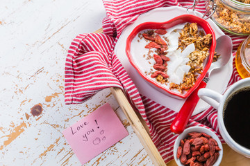 Valentine's day breakfast - granola with yogurt, goji berries and coconut