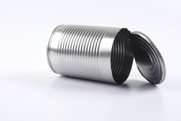 Empty oped aluminum can isolated on white.