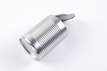 Empty oped aluminum can isolated on white.