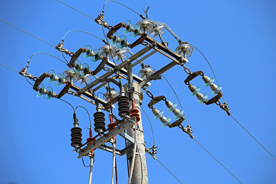 big switches of a high voltage power line with  concrete pole an