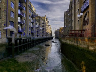 Wharf in London with converted warehouses