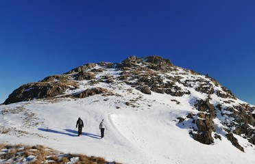 Winter fell walking on Little Hart Crag, the Lake District 