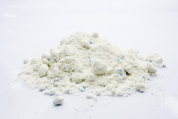 Powder detergent isolated on white.