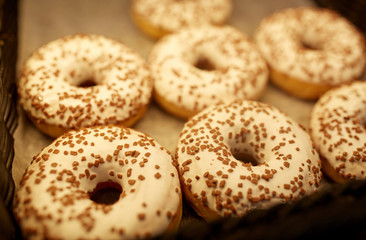 close up of donuts at bakery or grocery store