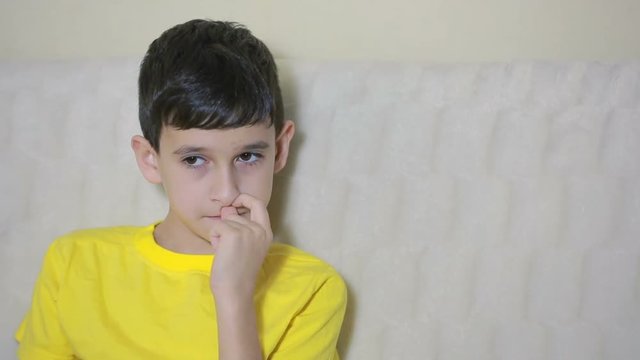 Boy biting his nails obsessive-compulsive disorder, child psychology