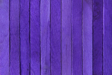Purple wooden background.