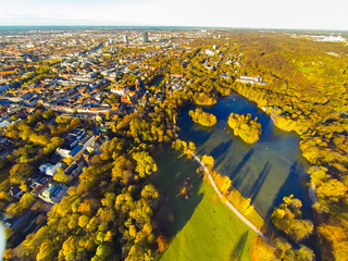 Aerial View Of Urban Park With Lake