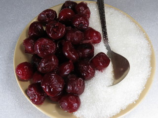 Frozen cherries and sugar