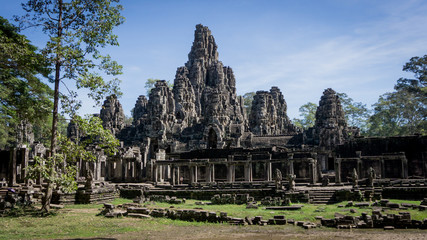 Fototapeta na wymiar Siem Reap, Cambodia, December 06, 2015: The many face temple of Bayon at the Angkor Wat site in Cambodia