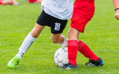  Boys kicking ball