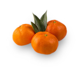  Ripe mandarin with leaves close-up on a white background