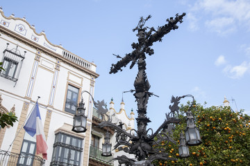 Fototapeta na wymiar Cross in Plaza Santa Cruz Square, Seville