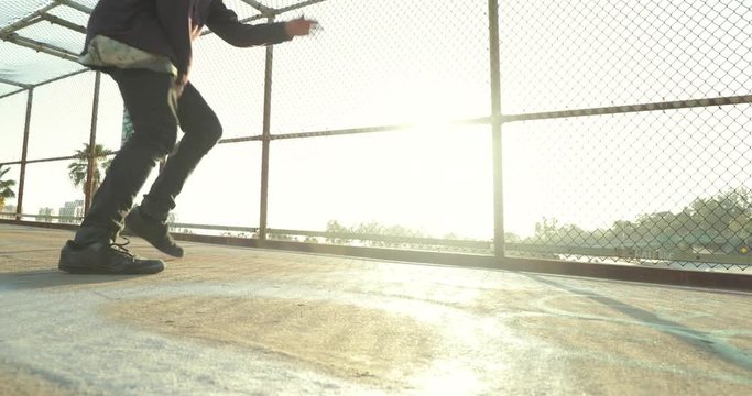 Young Man Breakdancing At Sunset 