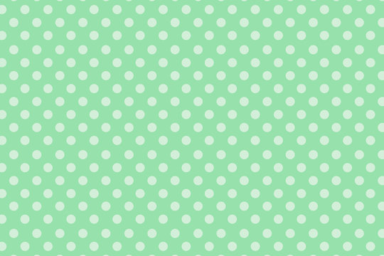 white polka dots on green background