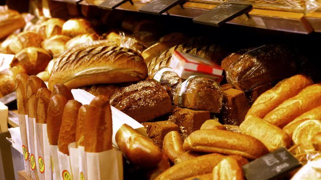 Close-up of shelves with bread at supermarket 4k