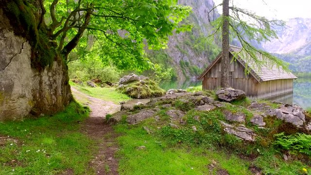 Beautiful mountain lake Obersee with old wooden cottage, Alps, Germany