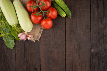 Tomatoes, garlic, cucumbers, zucchini, dill and horseradish leav