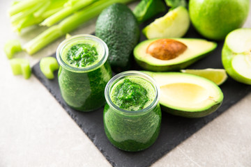 Blended green smoothie with ingredients. Superfood, detox 