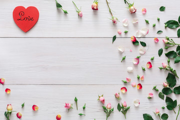 Valentine day background, hearts and flowers on white wood