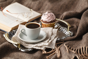 Relaxing coffee cup and books
