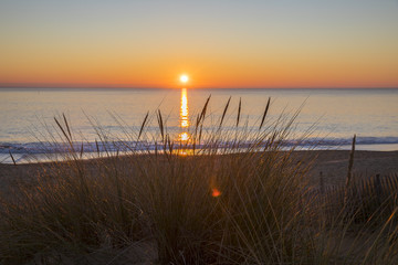 Magical and romantic sunset over the sea in winter