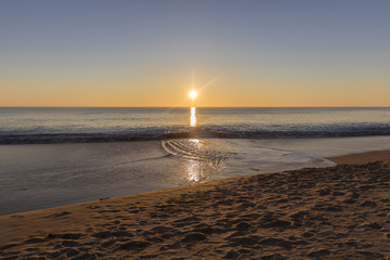Magical and romantic sunset over the sea in winter
