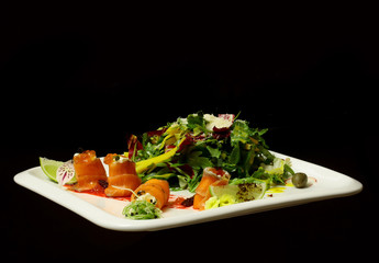 Red fish rolls and salad