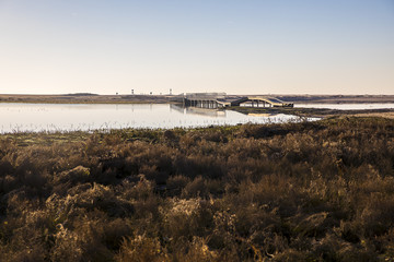 dusk on lagoon at nature reserve Casse de la Belle Henriette after sea went over the dike after the...
