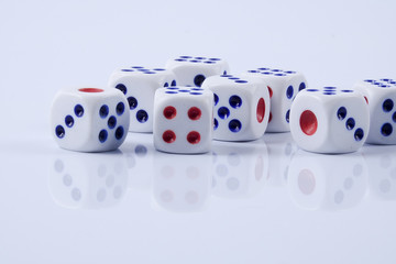 White dice on white background.  Concept of luck, chance and leisure fun