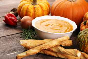 Pumpkin soup on a wooden table