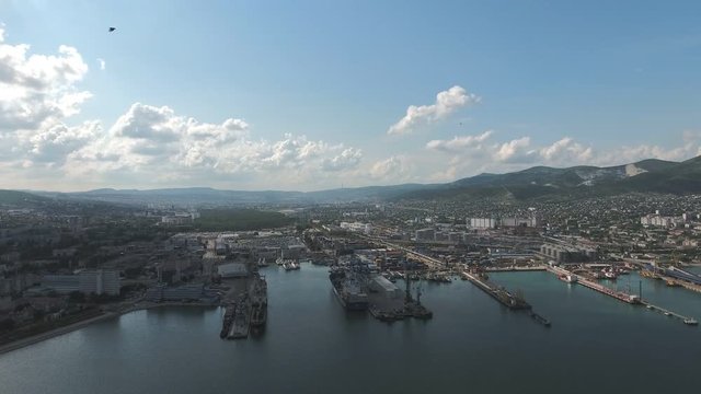 Top view of the marina and quay of Novorossiysk. Urban landscape of the port city.