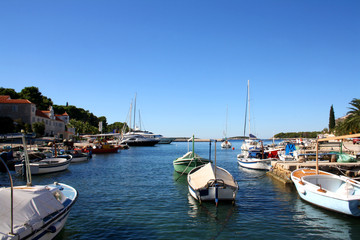 Fototapeta na wymiar Small fishing boats in the port of Maslinica, town on island Solta. 