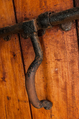 Metal Latch on a Wooden Door
