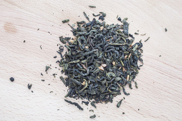 Fototapeta na wymiar green tea on wooden background.