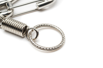 silver coil spring of carabiner keychain or keyring on white bac