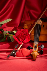Fototapeta premium Violin, red rose and heart.