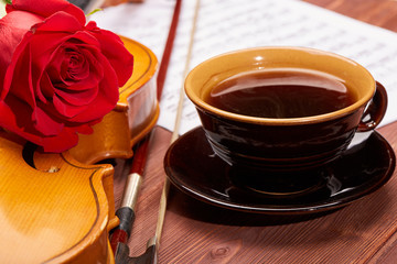 Violin, rose and notes..
