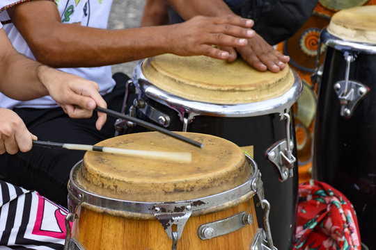 Percussion instrument called atabaque being played in traditional Brazilian party