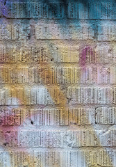 close up on spray painted brick wall background