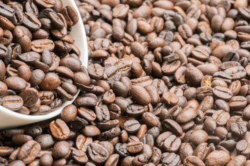 Coffee beans in  coffee cup