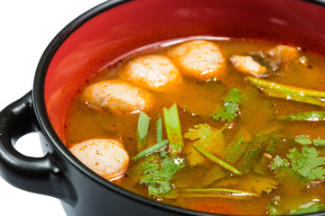 Hot and sour seafood soup,