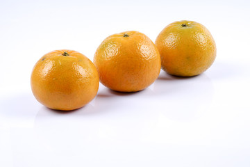 Mandarin orange citrus fruit isolated on white background.