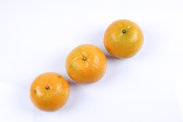 Mandarin orange citrus fruit isolated on white background.