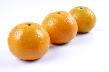 Mandarin orange citrus fruit isolated on white background.