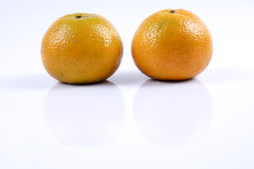 Mandarin orange citrus fruit isolated on white background.