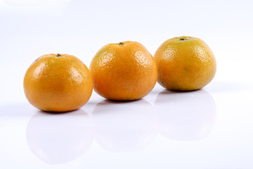 Mandarin orange citrus fruit isolated on white background.